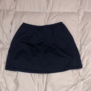 Navy blue tennis skirt with shorts under.